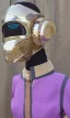 Placeholder: Camouflage colors are terracotta, cream and purple, lilac and Cream latex! European daft punk woman. Mantle is sewed of recycled Denim and sewed together of recycled polymer felt. Yellow(Munsell) areas. hint of orange as effect color!!Big bright purple/khaki felt tippet and cream or blue or lilac colored-hood. mantle is merged with satchel. . AKG-style headphones (gold rings!) is merged with small felt cap with small visor. Style: Haute Couture in 1998