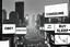 Placeholder: greyscale cityscape; many large white billboards populate the city with black block lettering with single word text "OBEY", or "REPRODUCE", or "CONSUME", or "BUY", or "SLEEP", 'They Live' movie by John Carpenter movie still, modern movie city panorama aesthetic, concept art