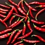 Placeholder: Chili pepper landscape, black background