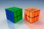 Placeholder: A single, tall Rubik cube face, Orange, white, blue, green