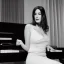 Placeholder: monica bellucci playing piano