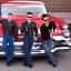 Placeholder: a 50s Greaser BAND standing in front of a hot rod