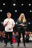 Placeholder: Norwegian Identical teenage twins celebrites, same sex gender standing on a stage with holding their hands, lot of photographers, flashing lights, identical twins with same sex gender, Identical twins, Celebrites