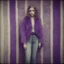 Placeholder: Hippie girl, jeans, purple fur, striped wallpaper, old autochrome
