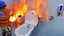 Placeholder: man sprays fire extinguisher all over toilet in the bathroom