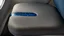 Placeholder: close up on wet spot on airplane seat cushion