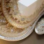 Placeholder: photorealistic glass slipper, a hyerrealistic transparent body, crystal, shells, pastel colours flowers and leaves transparent, professional light, rococo, Artstation, intricate detail realism hdr, intricate detailed 8 k, with ornate jewelled, intricate detailed 4 k