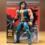 Placeholder: A photograph of a pristine action figure encased in its packaging, evoking a sense of collectible wonder, styled after a vintage toy advertisement. The box prominently displays "Rambo" in bold, stylized lettering, with the action figure inside clearly resembling Sylvester Stallone as Rambo, possessing his iconic features and a lean, athletic build, confidently holding a pistol and a knife