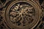 Placeholder: Looking down into a complicated large, old-fashioned, engraved, clock mechanism with hands