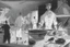 Placeholder: black and white storyboard, wide, on the Foreground there is a man and in the background, 3 chefs, scattered throughout the kitchen cooking, frying, cutting