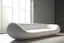 Placeholder: minimalist white curved sofa that is shaped like a sausage
