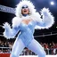 Placeholder: [photo from The Thing (1982)] Demonstrating her growing power as Queen of Winter, La Abominable crystallizes the very air around her, challenging any luchadora to defeat her in the ring;