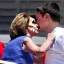 Placeholder: NANCY PELOSI, KISSING Volodymyr Zelensky WITH A BEARD wearing TANKTOP,