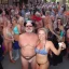 Placeholder: bikini clad solstice celebration attendees