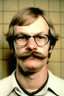 Placeholder: 30 years dahmer unhappy mugshot with mustache