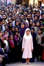 Placeholder: Opening shot: A noisy public place with a small and tense crowd gathered around Dr. Shumukh, a 10-year-old girl, a fierce and confident business leader Arabian style