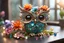 Placeholder: closeup, cute chibi sleeping owl fairy, Coloured glass flowers set with gemstones, glittering metal stems and gemstone leaves on a room table sharp focus elegant extremely detailed intricate very attractive beautiful dynamic lighting fantastic view crisp quality exquisite detail in the sunshine gems and jewels