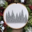 Placeholder: exquisite whimsical snowy forest in embroidery hoop, intricate, highly detailed, linen and wood backdrop