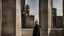 Placeholder: a Persian big man in a modern street in Tehran with a tower.