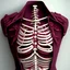 Placeholder: burgundy chest bones