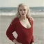 Placeholder: Marilyn monroe with long braids, in a large red woollen sweater, on the beach, in the sun