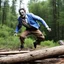Placeholder: Timothy Carey as a zombie, jumping on a log