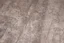Placeholder: scratched concrete floor, low angle