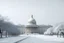 Placeholder: Make the US Capitol look very realistic, Washington DC on a snowy day, futuristic, white, dreamy, highly detailed 8k