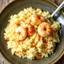 Placeholder: A creamy risotto infused with shrimp sauce for a rich, seafood flavor.