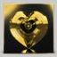 Placeholder: golden vinyl electric heart