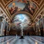 Placeholder: give a photo of a luxury musium hall with most famouse painthings of world