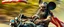 Placeholder: hi speed bad ass cyber punk masculine realistic zombie mickey mouse rambo humanoid with hairy arms and chest, on trike , motion blurred background, holding american flag