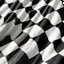 Placeholder: Generate a compelling image with a finish flag serving as the background amidst swirling smoke. Ensure a dynamic composition with the flag subtly emerging through the ethereal smoke. Pay attention to details, crafting a realistic representation of the finish flag and the intricate patterns of smoke. Strive for a visually captivating scene that conveys both the triumphant essence of the finish flag and the mystique of surrounding smoke