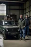 Placeholder: two haggard in their mid 30s looking men working in a land rover warehouse selling car parts to the public