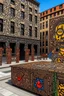 Placeholder: A brown construction zone grounds near a city designed in African masks painted by Keith Haring