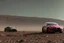 Placeholder: A Tesla 'Model Y' is racing at top speed, at the Cydonia region on Mars. (CINEMATIC, WIDE ANGLE LENS, PHOTO REAL)