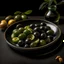 Placeholder: A plate of black olives and a plate of green olives?