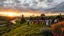 Placeholder: group of people are dancing in a national celebration in a village over high grassy hills,a small fall and river and wild flowers at river sides, trees houses ,next to Ripe wheat ready for harvest farm,windmill ,a few village local shops .people are dancing in a national celebration,cloudy sun set sky,a few village local shops