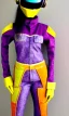 Placeholder: Photo of Asa akira. Camouflage colors are terracotta, cream and purple, lilac and Cream latex, imperial yellow, red plum. Baggy jeans! plant print.European daft punk woman. Mantle is sewed of recycled Denim and sewed together of recycled polymer felt. lace, Yellow(Munsell) areas. hint of orange as effect color!!Big bright purple/khaki felt tippet and cream or blue or lilac colored-hood. mantle is merged with satchel. . AKG-style headphones (gold rings!) is merged with felt cap, cyan small visor.