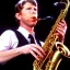 Placeholder: Eyes closed REd-haired Ron howard Is richie from happy days playing A saxophone with his "eyes closed", rock band, embouchure, joanie cunningham