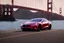 Placeholder: A Tesla 'Model S' is parked, on the 'Golden Gate' bridge. (CINEMATIC, WIDE ANGLE LENS, PHOTO REAL)