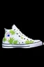 Placeholder: A converse sneaker with weed leaves printed on the material, green, yellow and red colors