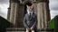 Placeholder: cat in a suit old castle