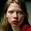 Placeholder: Blond Actress Mia Goth, in the 80s, close up, freckles on her cheeks, no eyebrows, pouty lips, red cheeks and nose, wierd face