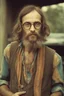 Placeholder: Hippie bohemian young ugly man with Parisian bohemian look and glasses of colours and poor and short short short and poor hair on the head with receding hairline. Farsightedness glasses with big eyes. Long beard. Vintage look and feel like photo styleof the 70s