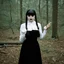 Placeholder: Actress theda bara as Wednesday addams, braids, bangs, in tge woods