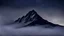 Placeholder: one single mountain sharp face rises out of the mist into the night sky.