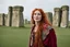 Placeholder: A tall slim red-headed woman, dressed like a gipsy, standing in front of Stonehenge