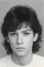 Placeholder: 1980's yearbook photo, teenager, Tommy Lee, 14 years old, photorealistic, --ar 9:16 --style raw