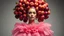 Placeholder: High fashion photography of a model in a Tim Walker and Alexander McQueen style pink plum dress, studio lighting, large-scale headdress with many fruits, wide shot, highly detailed, hyperrealistic, cinematic photography - ar 9:16. High fashion photo shoot of a model in a Tim Walker style pink plum dress, intricate headdress made of conceptual plum fruit sculptures